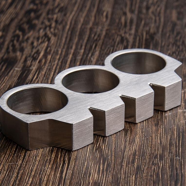 Brass Knuckles Paperweight